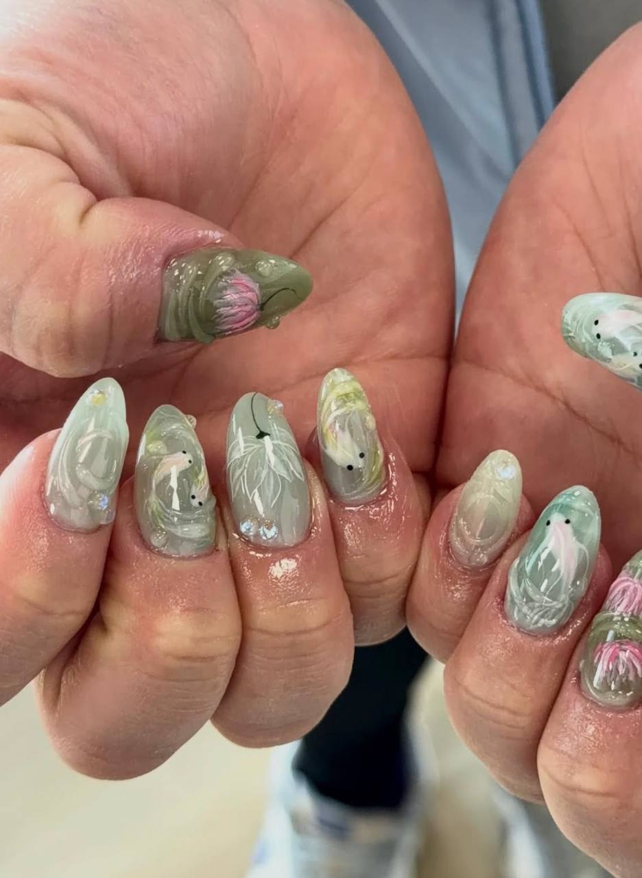 Sage green watercolour floral nail art